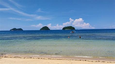 Keindahan Wisata Pantai Pasir Putih Pulau Tiga Bolaang Mongondow