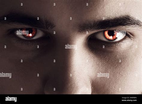 Evil Eye Man With Red Demonic Eyes Closeup Stock Photo Alamy