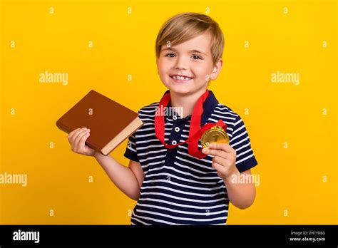 Photo portrait little boy wearing golden medal prize for best student ...