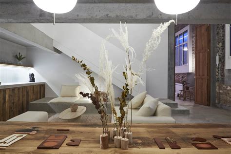 Rotunnojustman Combines Naked Concrete Details With Brick To Form Sleek Interiors For Photo Studio