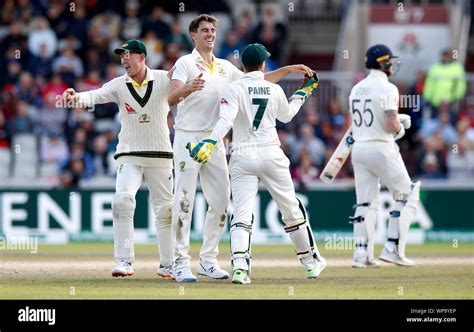 Australia S Pat Cummins Centre And Tim Paine Right Celebrate Taking