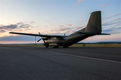 A German C-160 aircraft stages on the tarmac prior - NARA & DVIDS Public Domain Archive Public ...