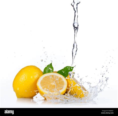 Fresh Lemons With Water Splash Isolated On White Background Stock