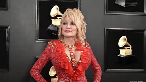 Still Working 9 To 5 Dolly Parton Expands Her Business Empire The