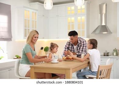 Happy Family Eating Together Table Modern Stock Photo 1880804101 ...