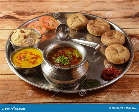 Rajasthani Traditional Cuisine Dal Baati Thali Lentils With Hard