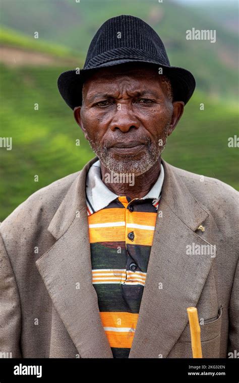 Elderly Man Standing In Western Rwanda Stock Photo Alamy