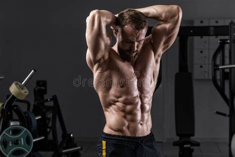 Muscular Man In Gym Showing Muscles Abs Strong Male Naked Torso Stock Photo Image Of Chest