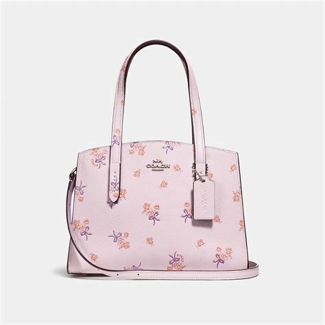 COACH Charlie Carryall 28 With Floral Bow Print - Women's Designer Handbags | Womens designer ...