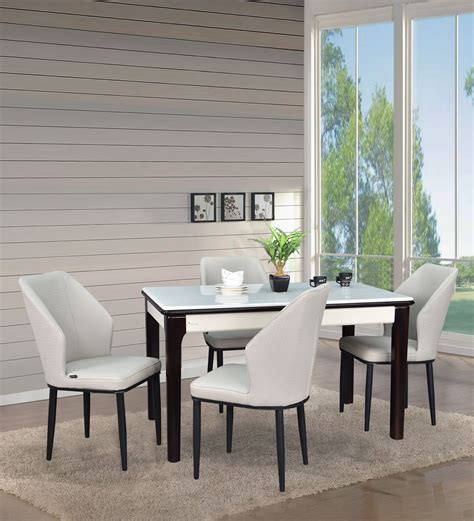 Buy Enigma Marble Seater Dining Set In White Black Colour At