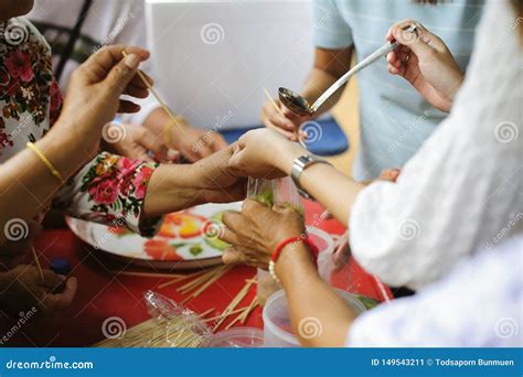 Hand Feeding To The Needy In Society Concept Of Feeding Volunteers