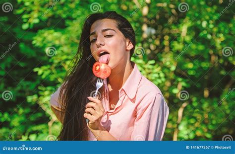 Girl Holds Fork With Juicy Ripe Tomato Lady Attractive Brunette Eats Tomato Seductive Appetite