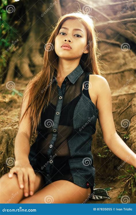 Young Sexy Beautiful Asian Girl Sitting On The Hill Ground Stock Image Image Of Portrait