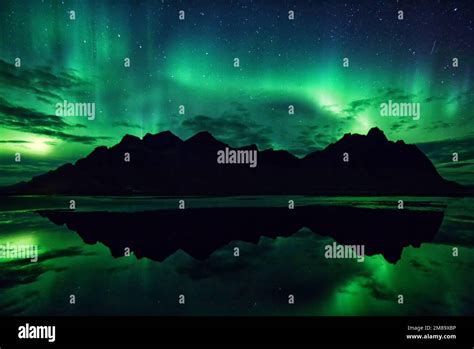 aurora borealis northern lights  vestrahorn iceland stock photo
