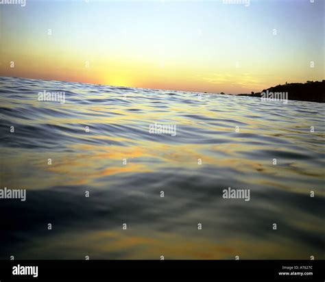 ocean sunset color colors colour colours Stock Photo - Alamy