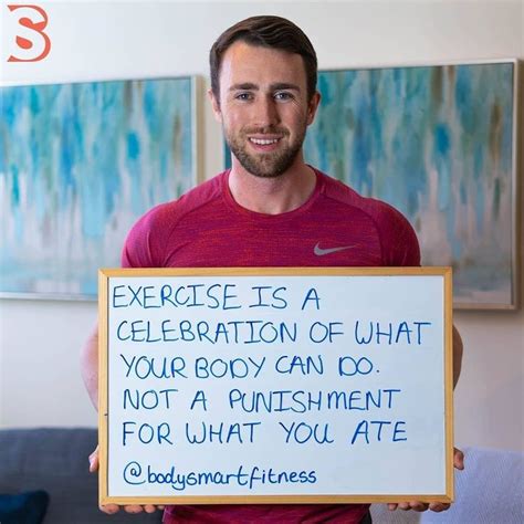 A Man Holding Up A Sign That Says Exercise Is A Celebration Of What