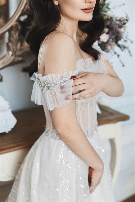 Beautiful And Sensual Brunette Model Girl In Stylish Lace Dress With Naked Shoulders Posing In