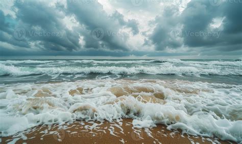 A rainy day at the beach, waves crashing against the shore and rain