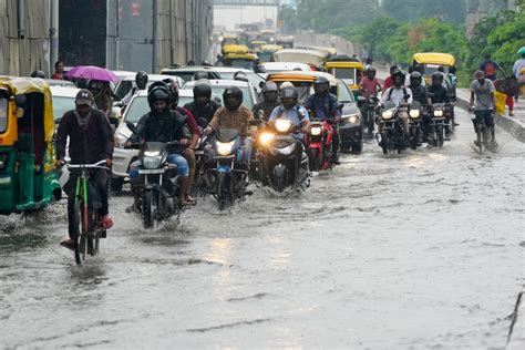 Monsoon Hits Delhi Ncr People Wake Up To Cooler Temperatures Water