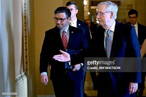 US Senate Minority Leader Mitch McConnell walks with US House Speaker ...