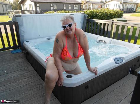 Fat Nan Bares Her Boobs While In A Patio Hot Tub Before Getting Naked On A Bed CoedCherry