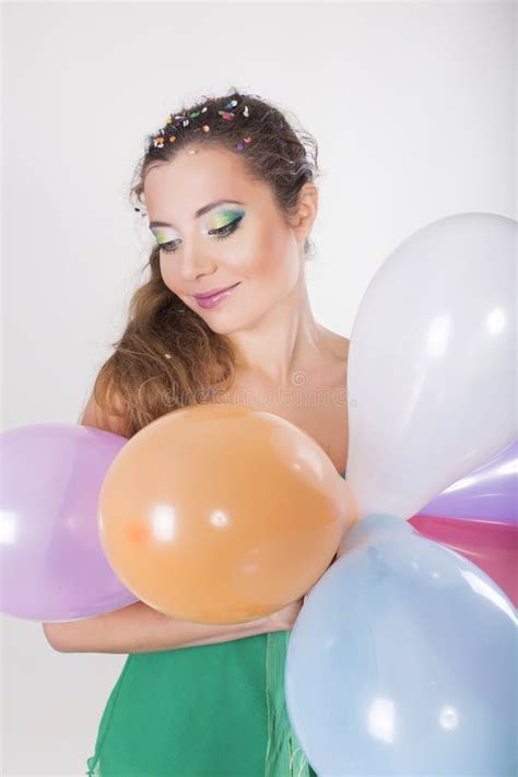 Brunette Woman Holding Balloons On Her Birthday Party Stock Photo Image Of Person Orange