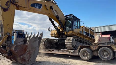 Loading And Transporting On Site The Caterpillar 385c Excavator