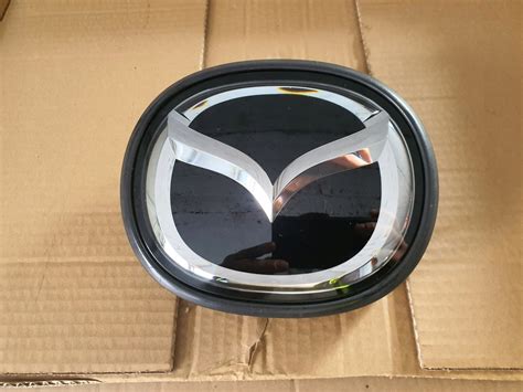 MAZDA 6 GJ CX5 ZNACZEK EMBLEMAT POD RADAR 12914734644 Oficjalne