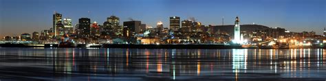 Night Time Skyline with towers and buildings over the water in Montreal