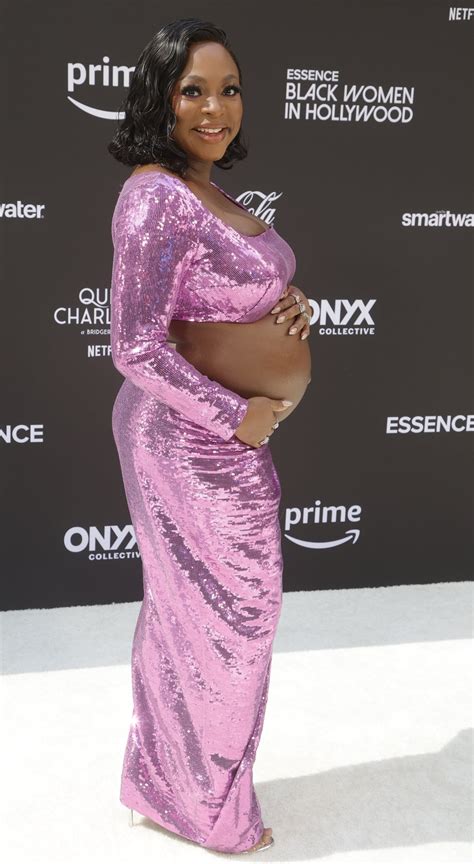 Naturi Naughton Highlights Baby Bump in Purple Ensemble at Essence