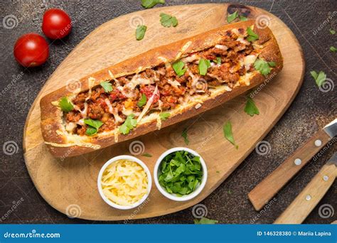 Baguette Stuffed With Bolognese Ragout Of Minced Beef Tomatoes And