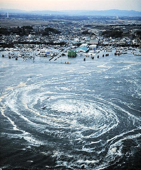 The tsunami waves swirl into whirlpools off the coast of northern Japan ...