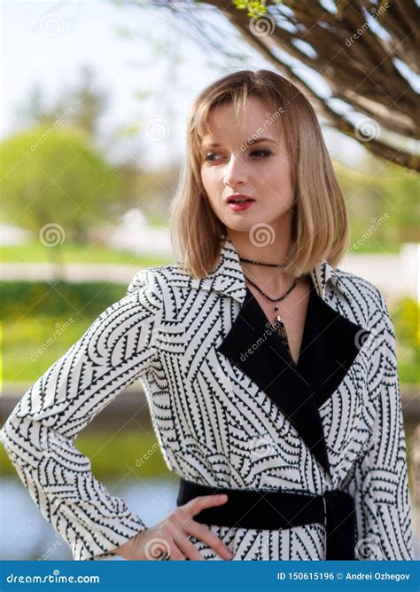 Blonde Woman In A Black And White Cloak Stock Photo Image Of Hair Cloak 150615196