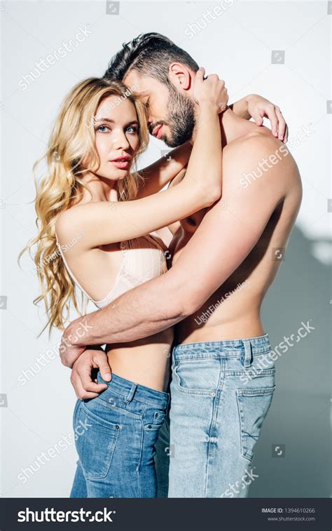Sexy Shirtless Man Hugging Attractive Blonde Stock Photo Shutterstock