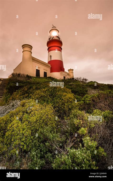 Cape Agulhas Lighthouse Illuminated At Dusk Agulhas National Park