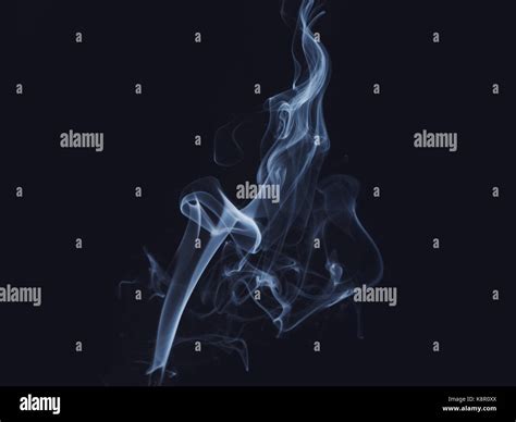 Extinguished Candle With Blue Smoke Stock Photo Alamy