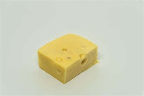 Yellow Cheese With Big Holes And White Background Stock Photo Image