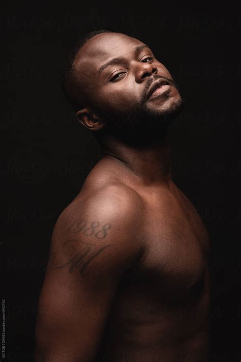 Naked Black Man With Closed Eyes By Stocksy Contributor VICTOR TORRES Stocksy