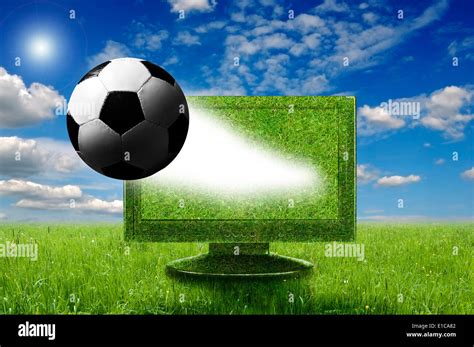 Soccer Ball Coming Out Of A Computer Monitor Stock Photo Alamy