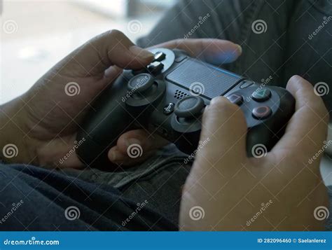 Close Up Of Hand Holding Playstation Stick Editorial Image Image Of