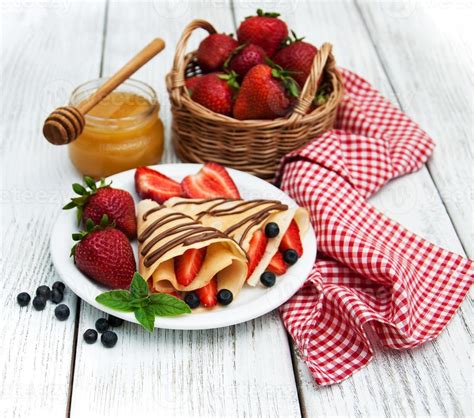 crepes with strawberries and chocolate sauce 5742660 Stock Photo at Vecteezy