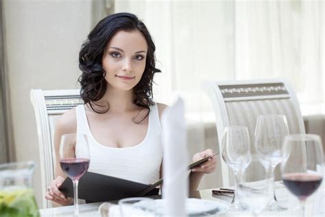 Premium Photo Curvy Slender Brunette Sitting At Restaurant Table