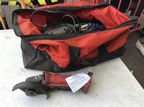 Milwaukee Cordless Angle Grinder Bag With Tools And Elecdrill Sold