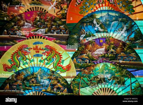 Hand fan painting / Asia Hand fan painting : Colorful background Stock Photo - Alamy