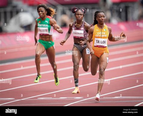 Marie-Josée Ta Lou competing in the 100 meters of the Tokyo 2020 ...