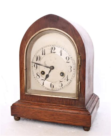 ANTIQUE JUNGHANS STRIKING Mantel Clock Arched Wooden Case Dated 1921