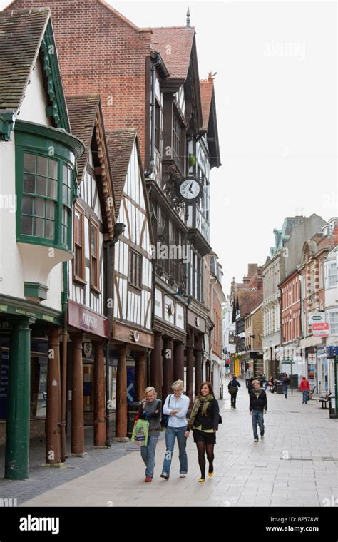 Young People Walking On Winchester High Street In England Stock Photo