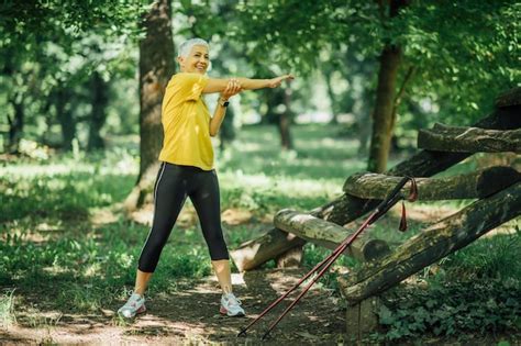 Premium Photo Senior Woman Stretching After A Outdoor Walking Exercise