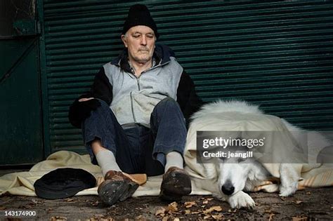 Homeless Man With Dog Photos and Premium High Res Pictures - Getty Images