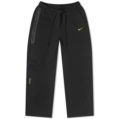 Nike Men S X Nocta Tech Fleece Pant In Black University Gold Nike